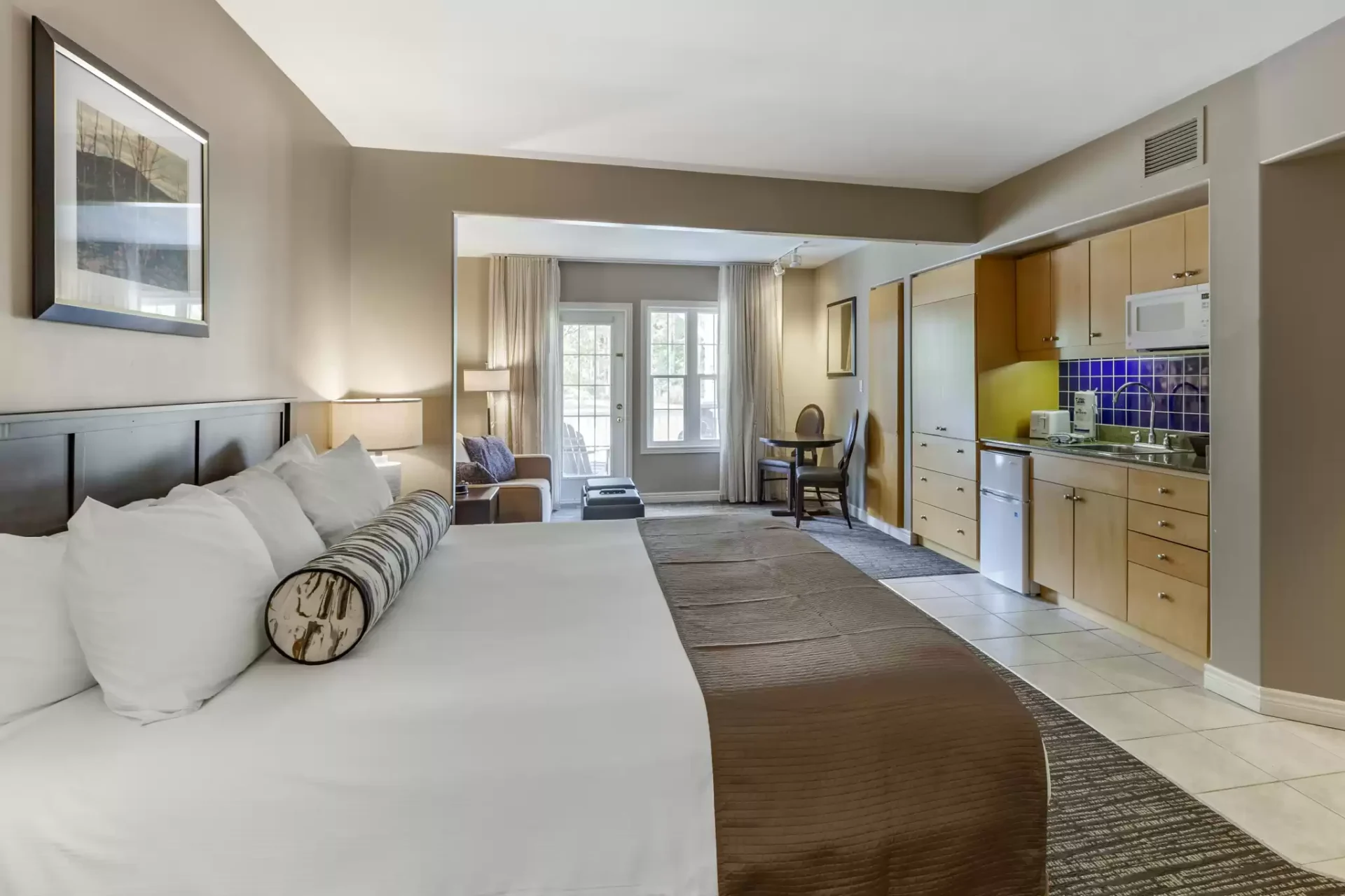 Carriage Ridge Resort One king bed suite with living room and kitchenette