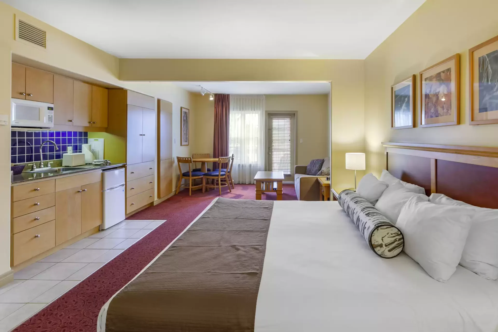 Carriage Ridge Resort One king bed suite with living room and kitchenette